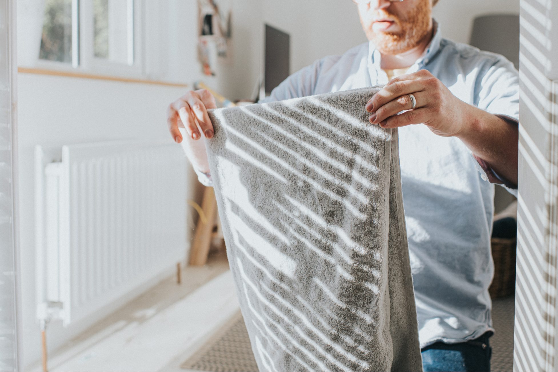 Folding a towel for the linen closet