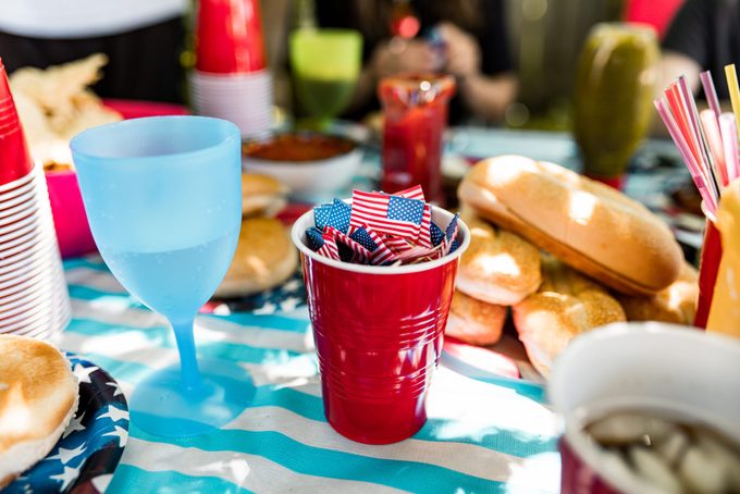 fourth of July barbecue table set up in a backyard