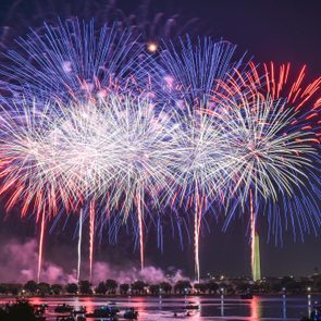 red, white, and blue fireworks over washington dc on the 4th of july