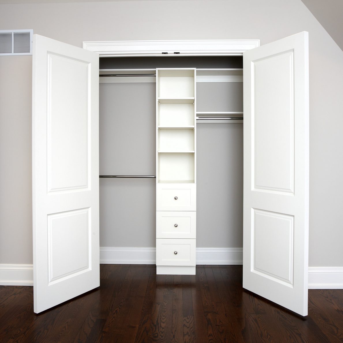modern bedroom with a closet featuring french doors