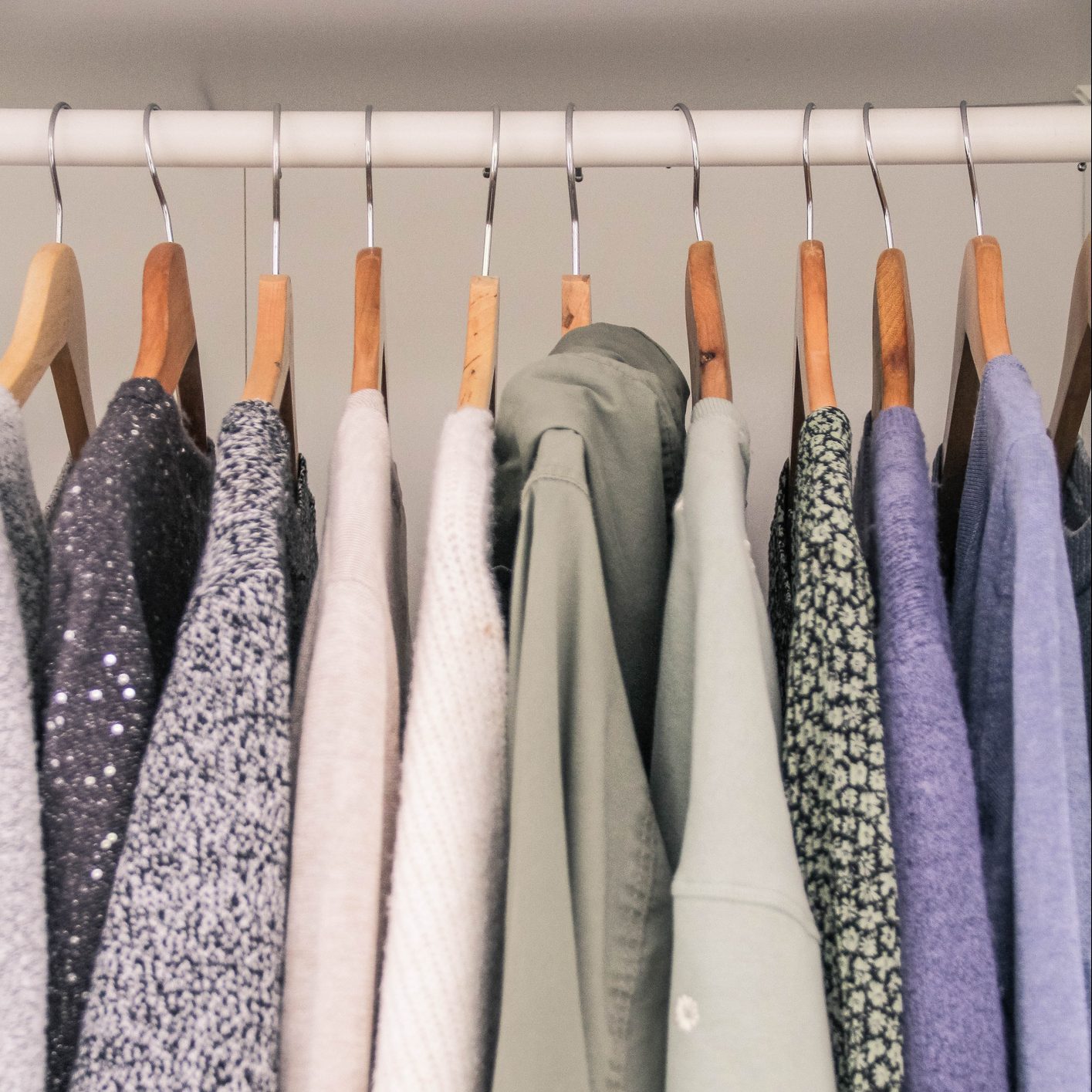 Clothes hanging in the wardrobe