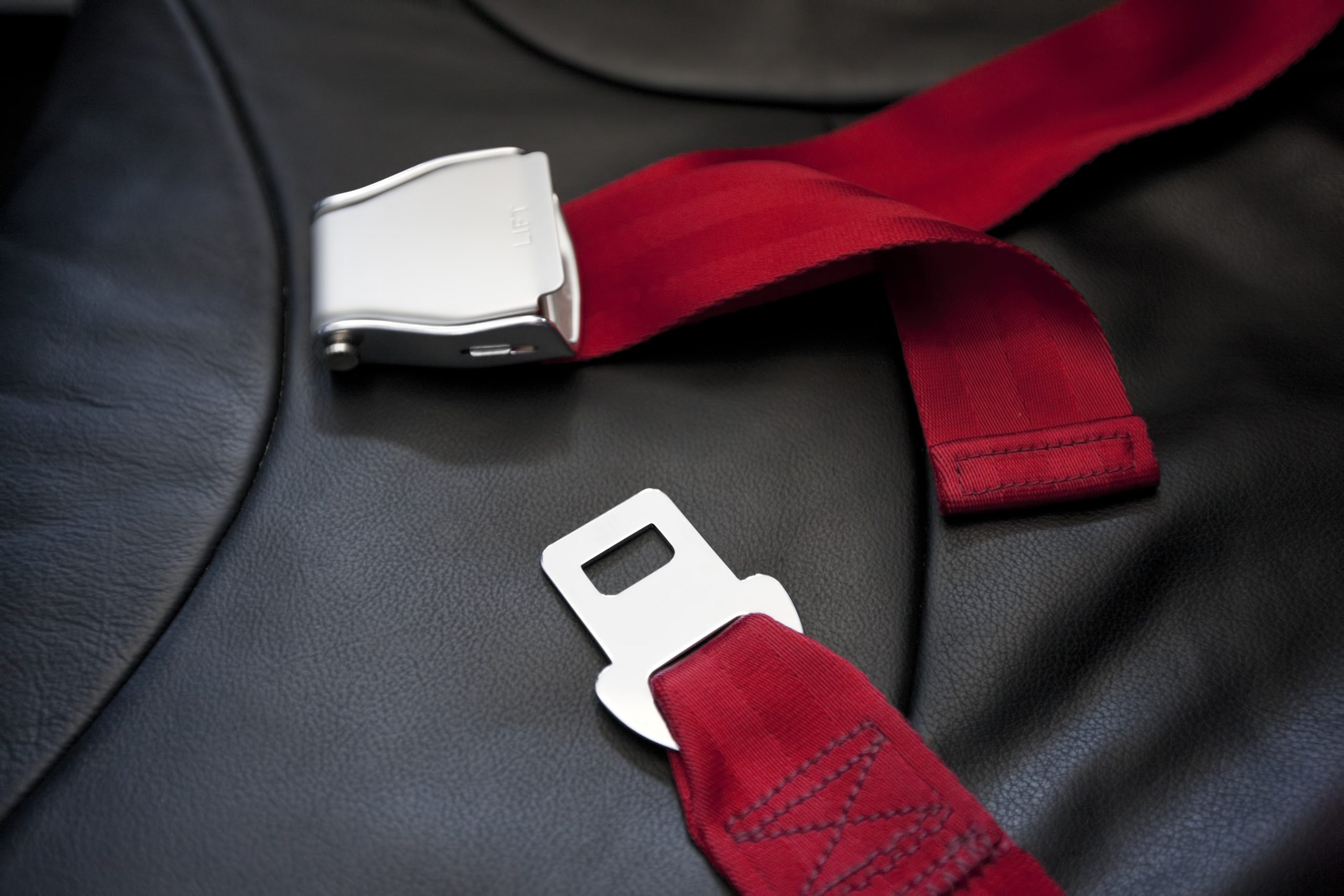 Commercial airliner seat belt.