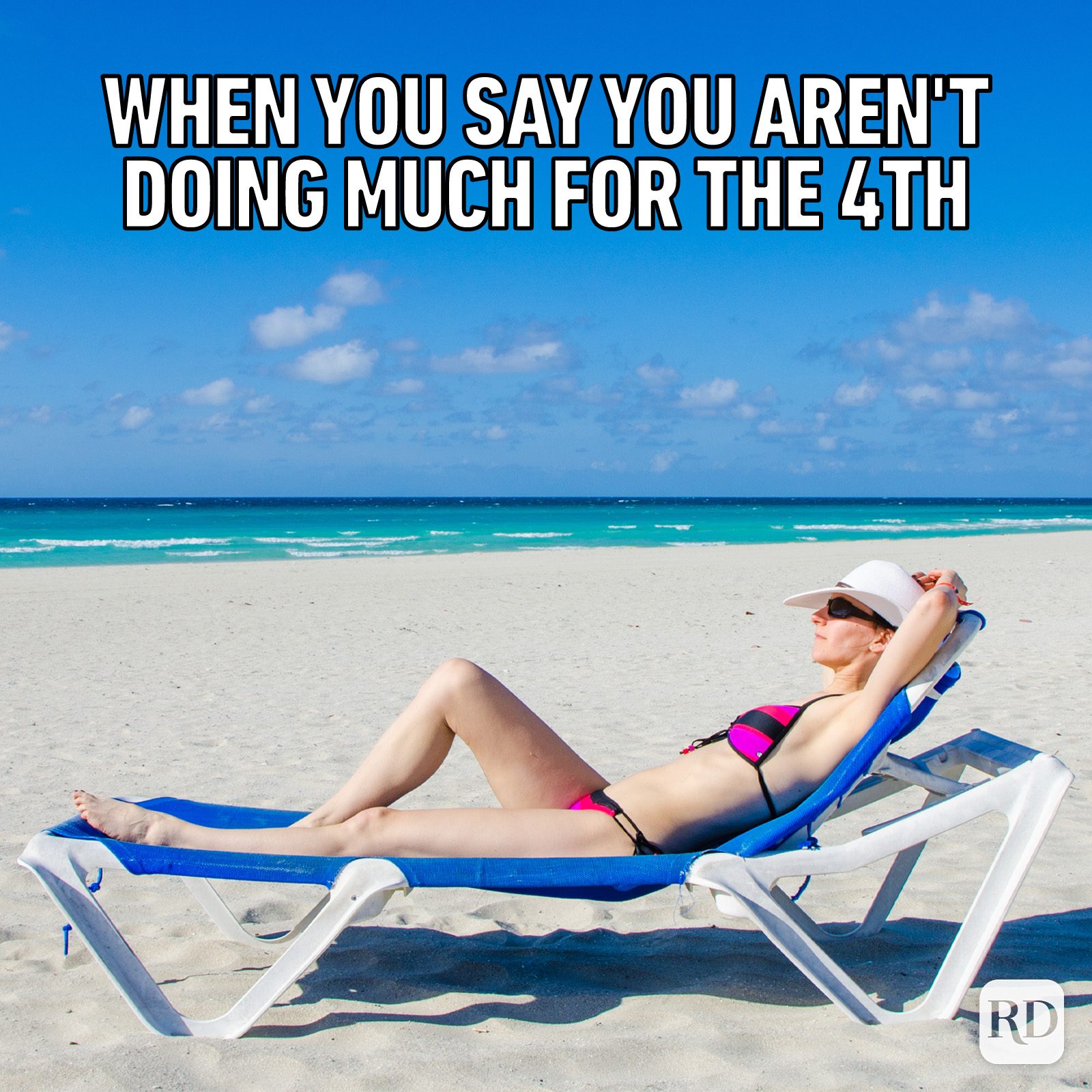 Gettyimages 470046956 A Woman In Swimsuit Sunbathing On A Long Chair On The Beach