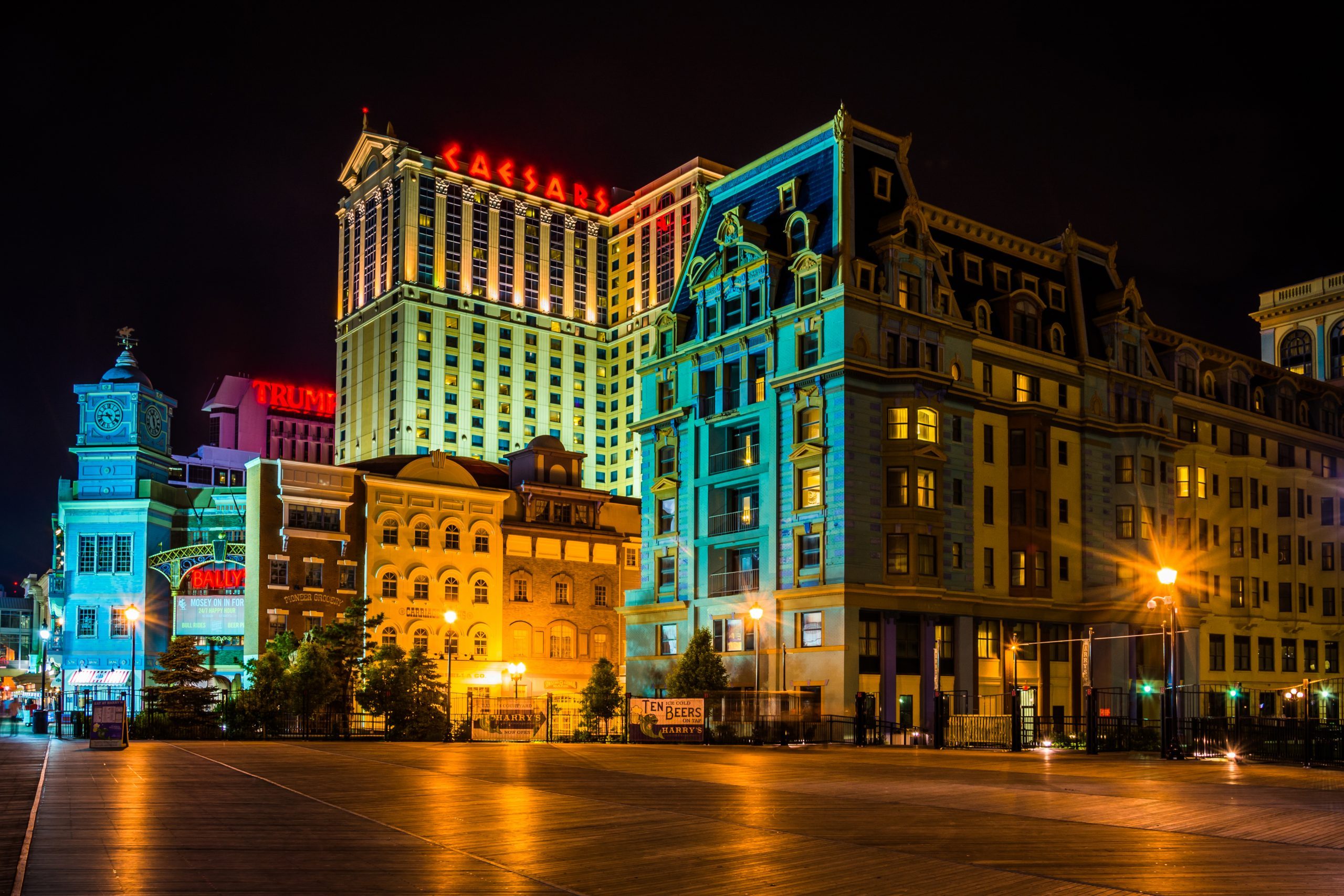 Buildings on the boardwalk at night in Atlantic City