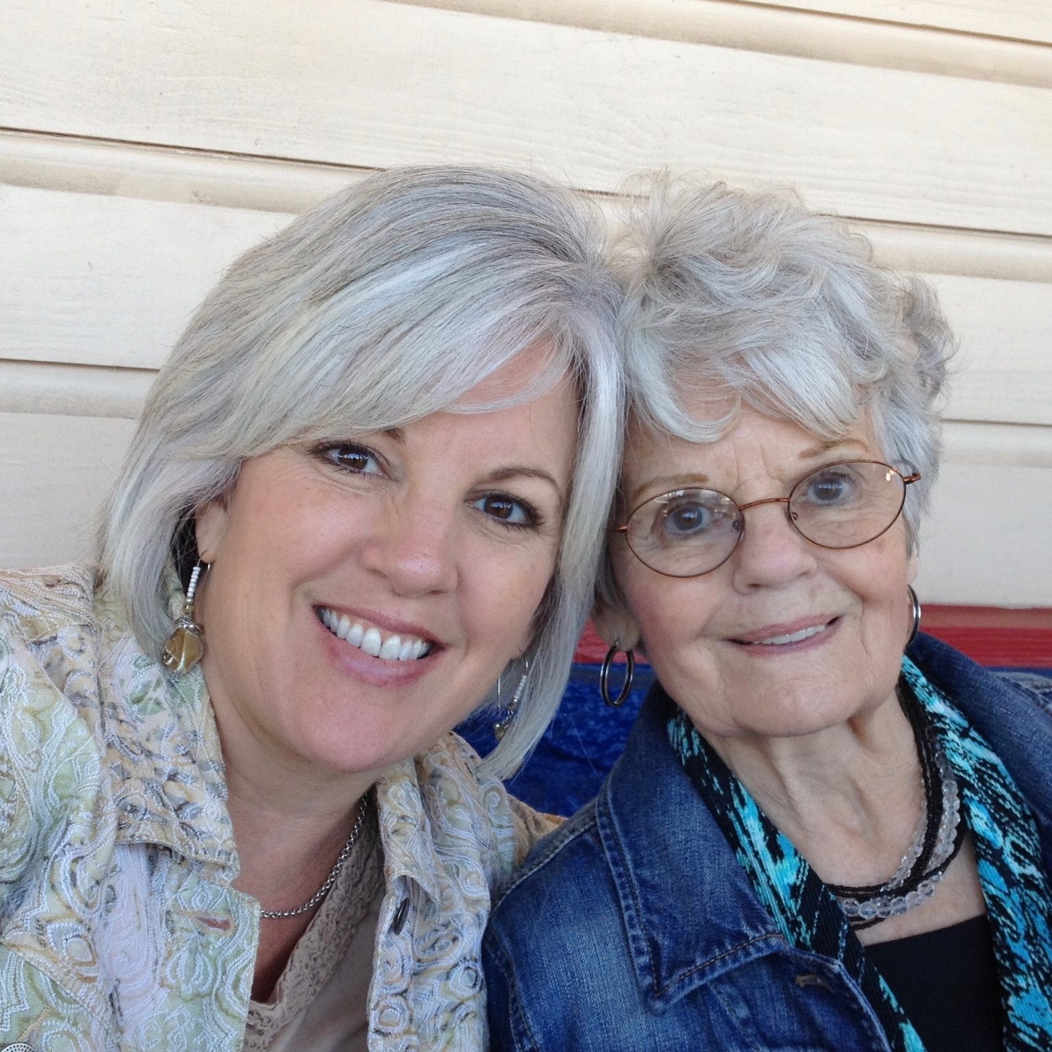 confident woman and her mother go grey at the same time