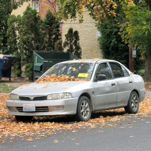 Abandoned Car with orange tag