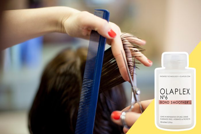 woman getting a haircut with inset of hair product