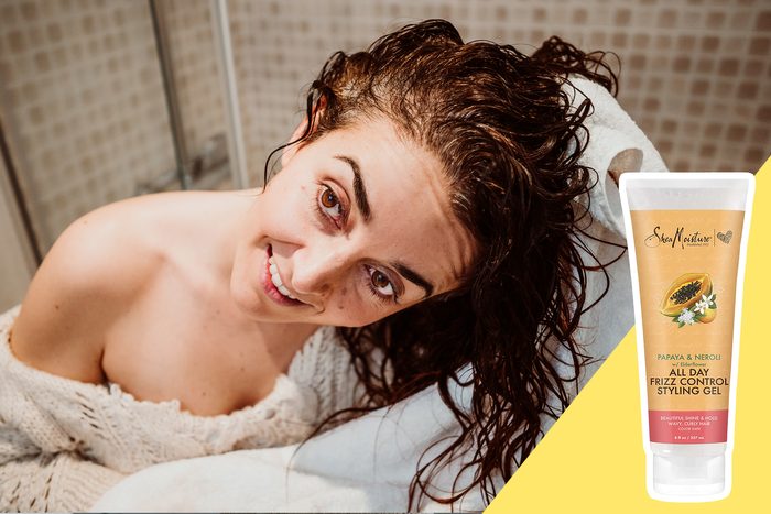 woman towel drying her hair