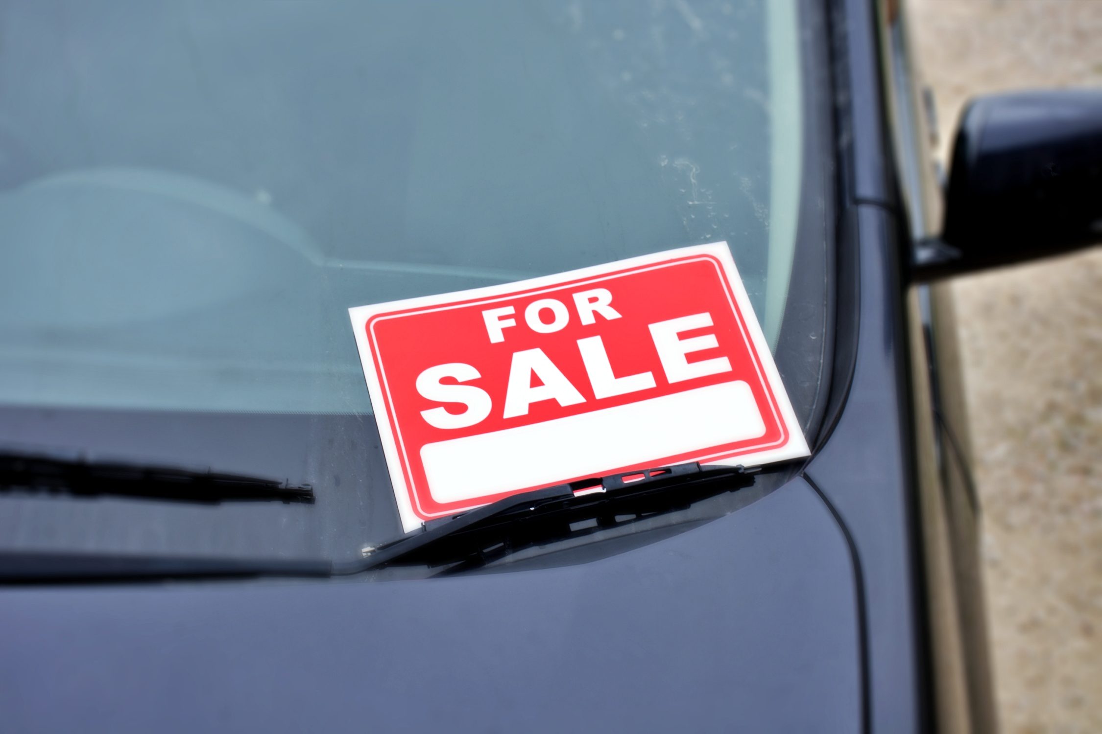 Car with For Sale Sign