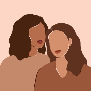 Two beautiful women with different skin colors stand together. Abstract minimal portrait of two girls in earth's natural tones. Concept of sisterhood and females friendship.