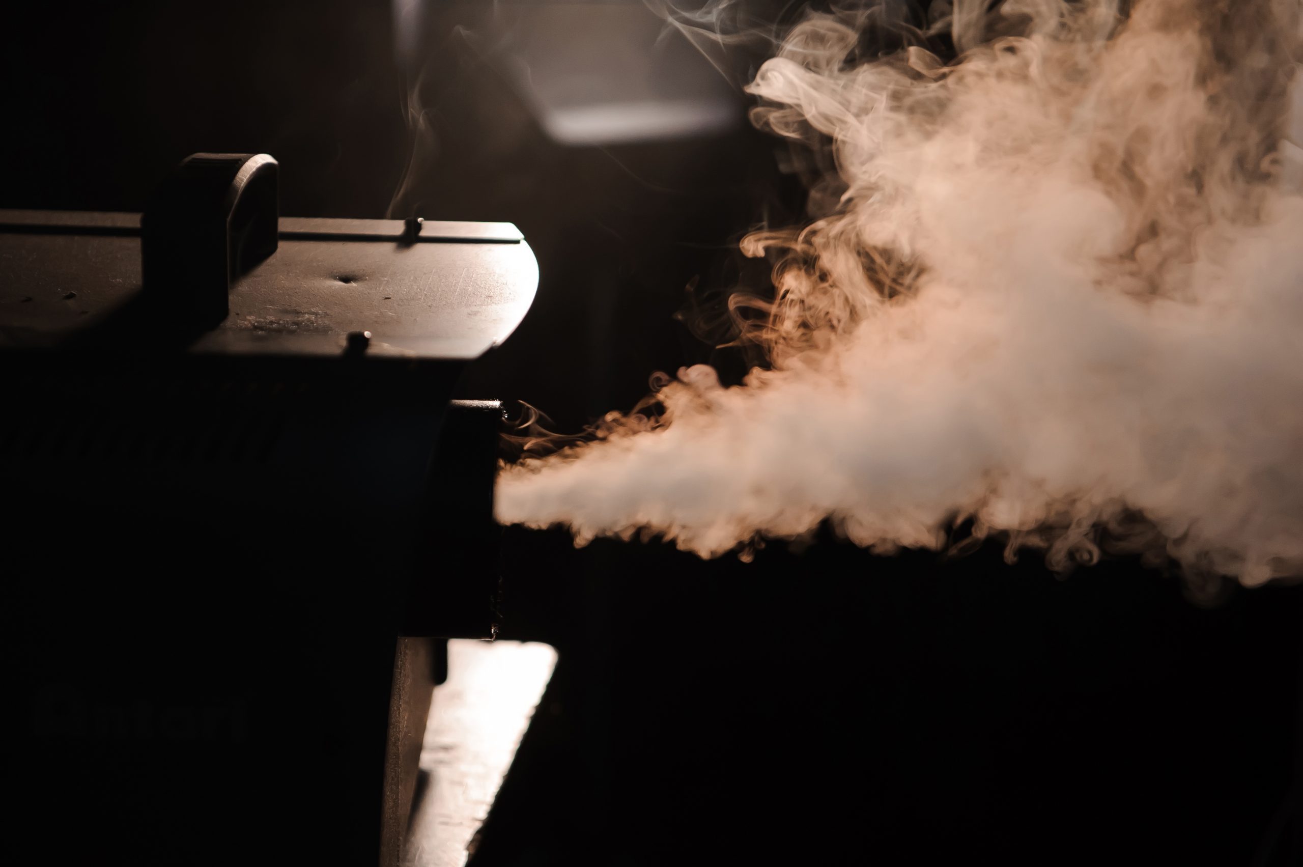 fog machine in dark room