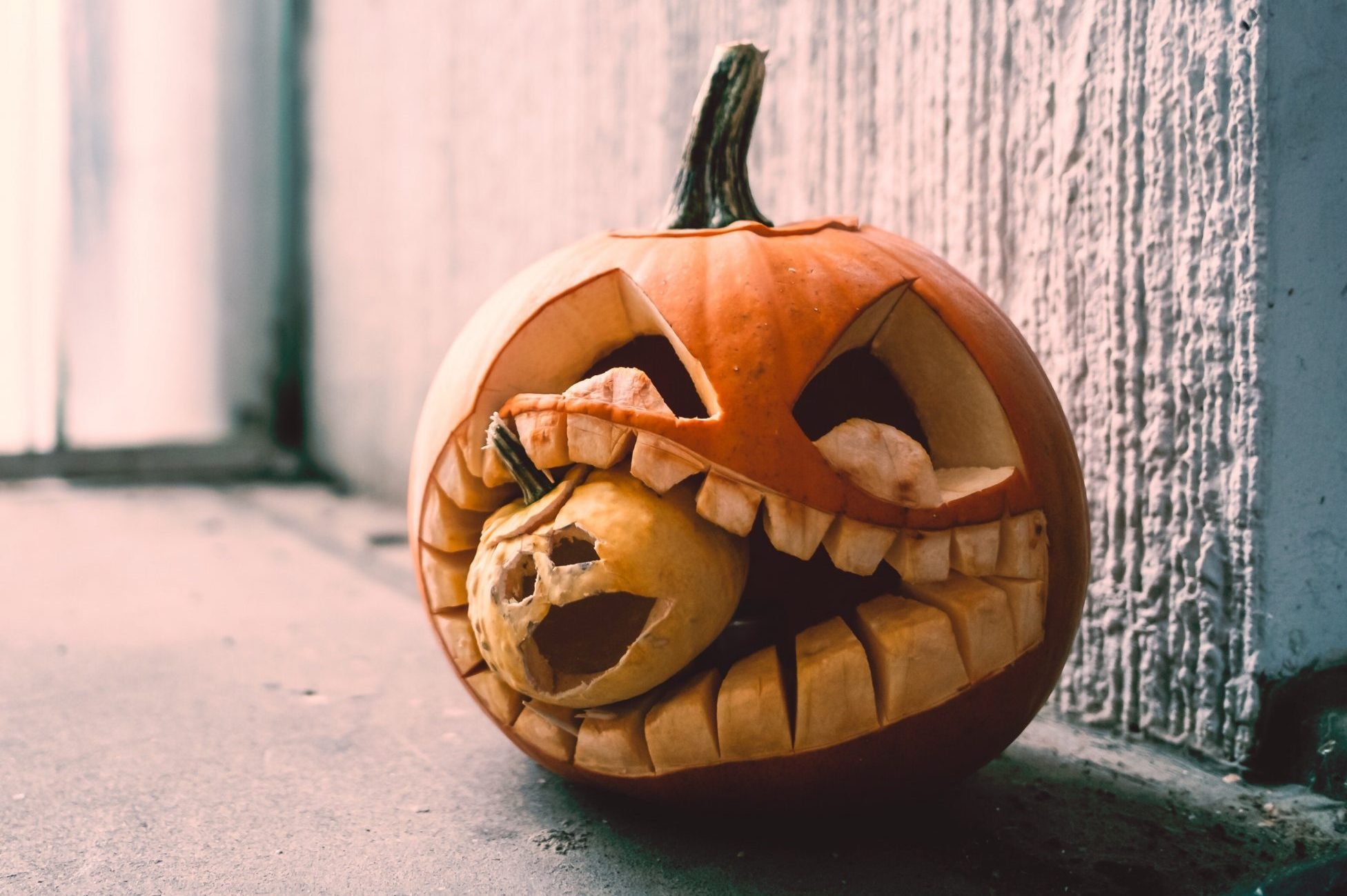 Close-Up Of Jack O Lantern On Window Sill During Halloween