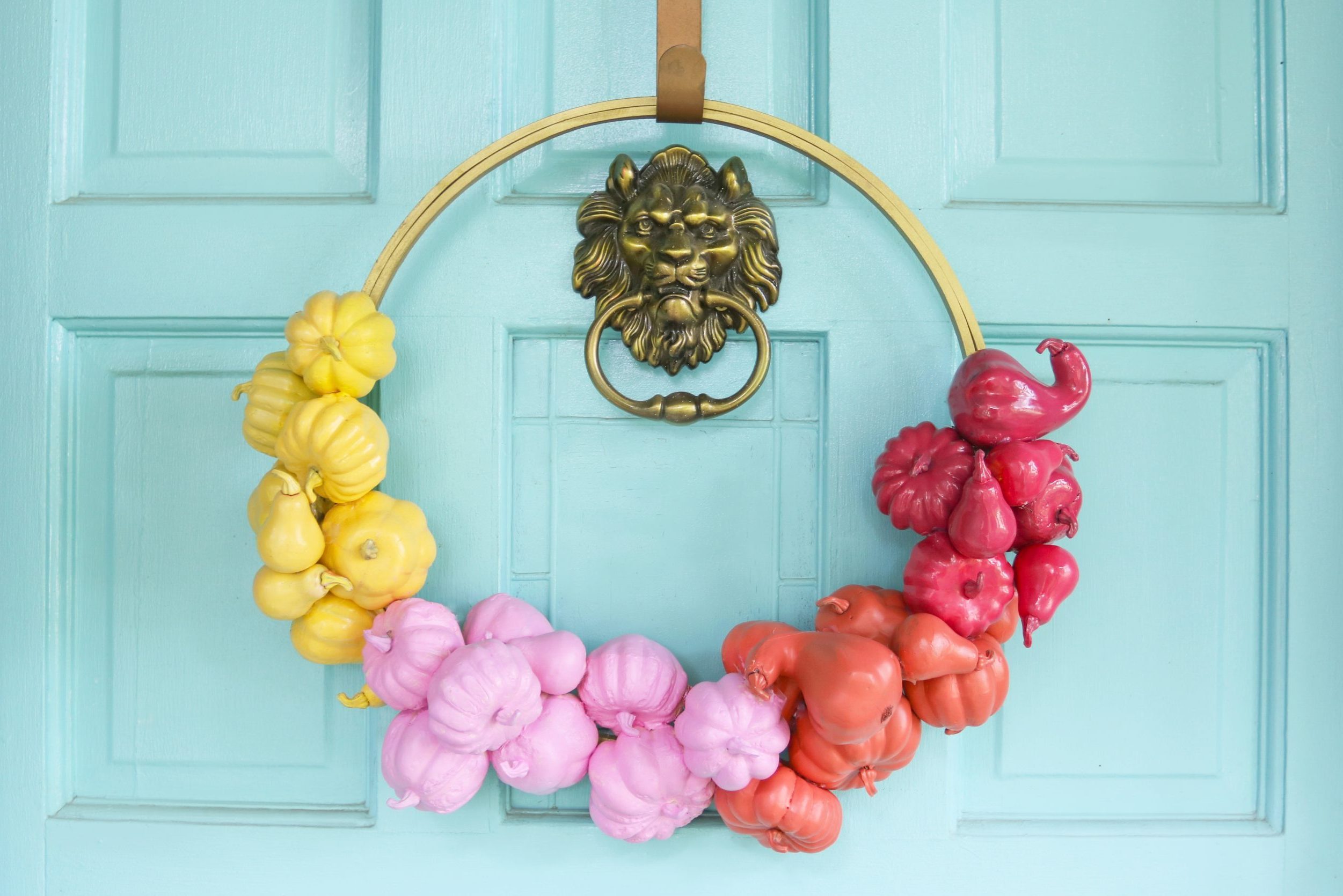 pumpkin garland wreath on front door