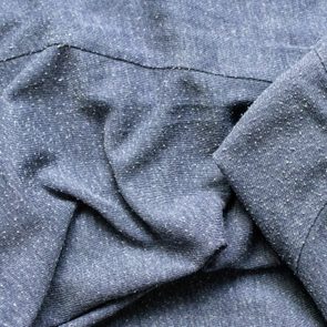 close up of pilling on gray sweater