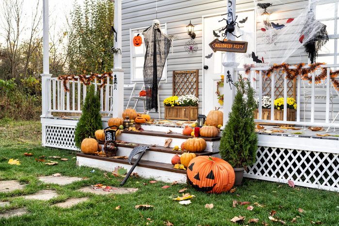 Halloween Jack-o-Lantern Pumpkins on a porch stairs