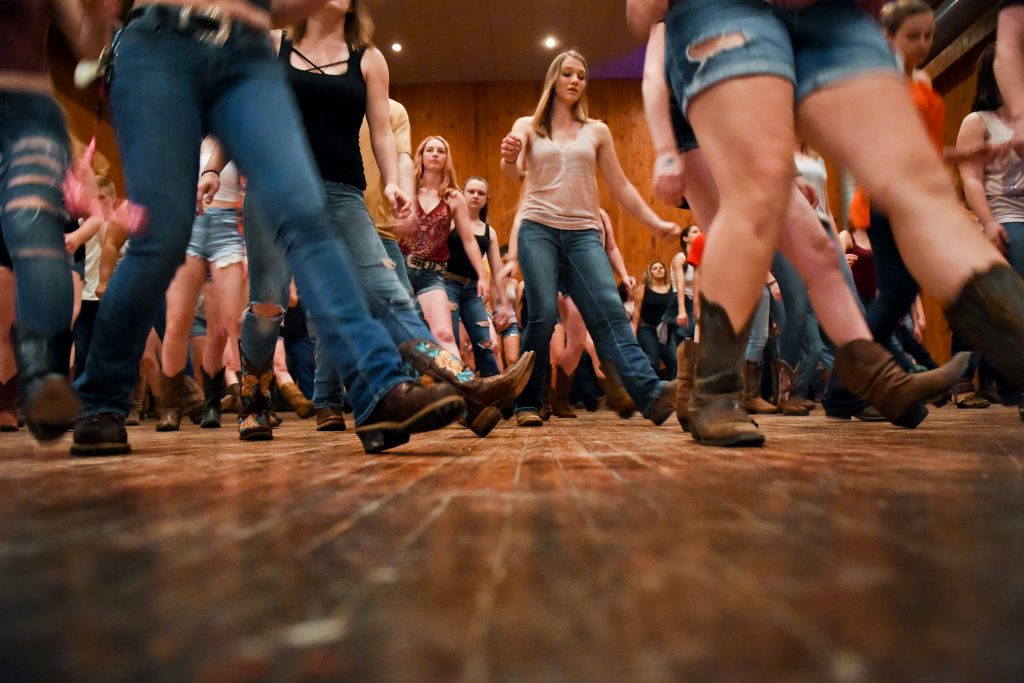 People participate in line dancing at CJ Hummels Restaurant, Bar and Gathering Place in Lenhartsville on Thursday, May 24, 2018. Photo by Natalie Kolb