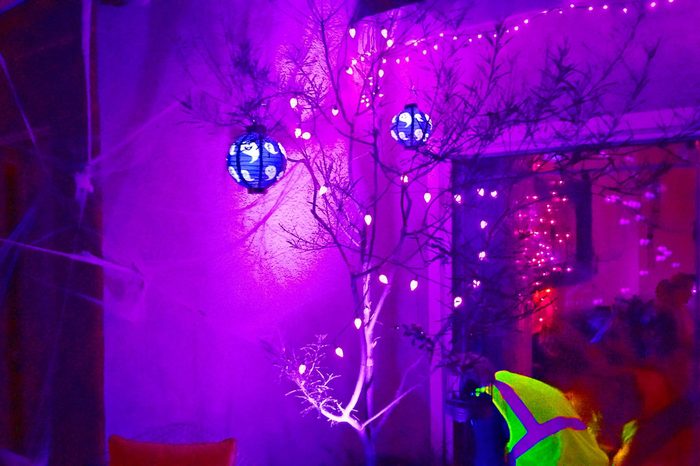 Illuminated Lanterns And Lights Outside House During Halloween