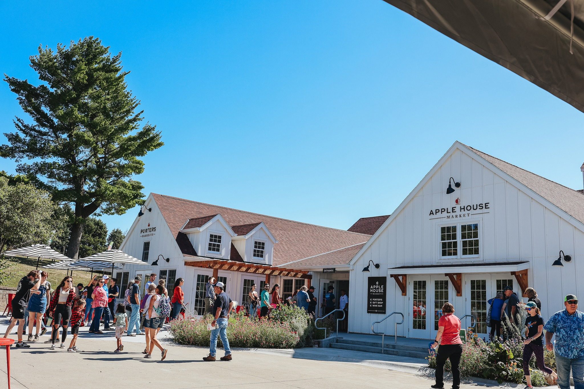 Arbor Day Farm buildings with a crowd