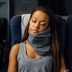 This Wrap-Around Neck Pillow for Travel Helped Me Sleep on a Plane for Eight Solid Hours