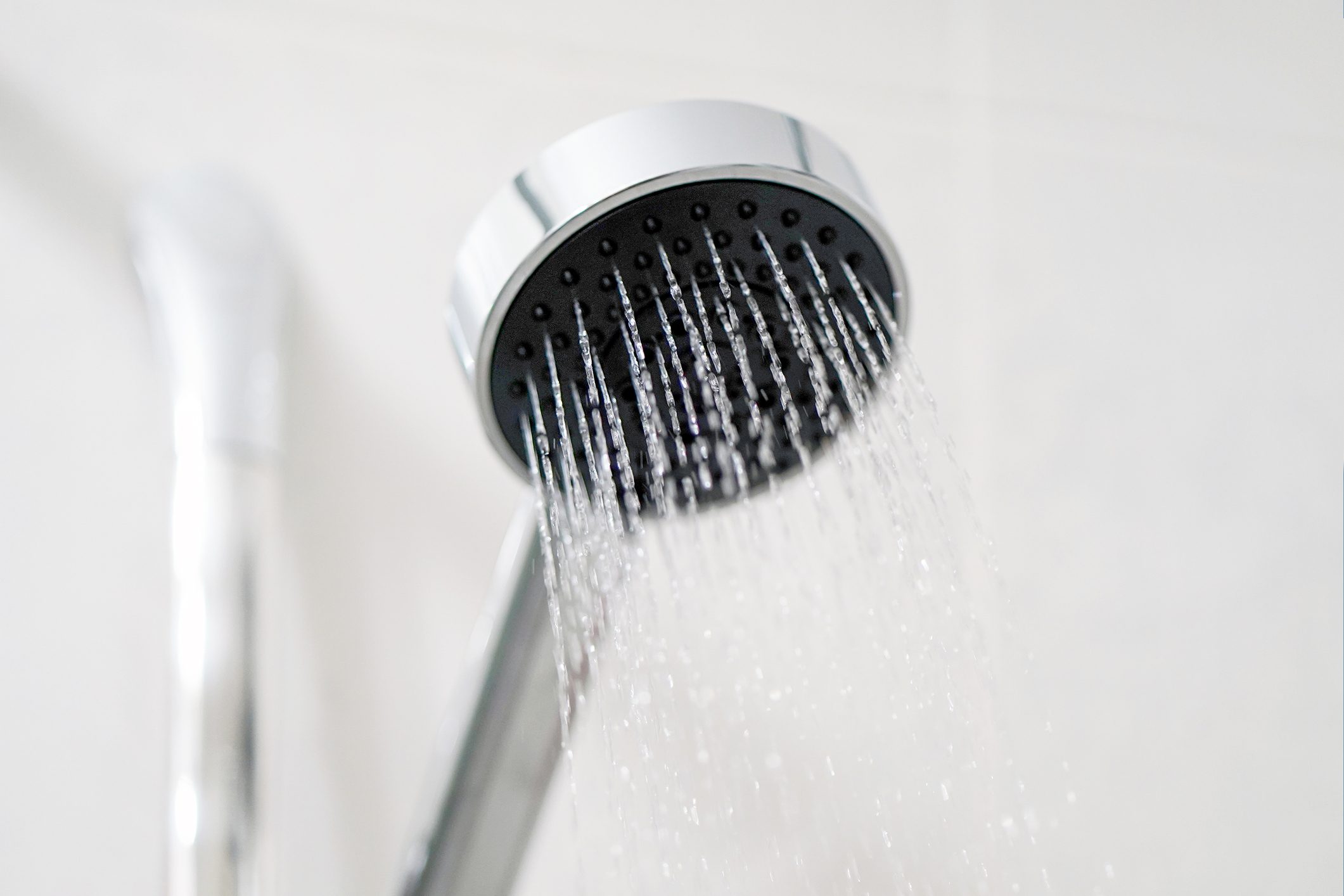 shower head in steamy bathroom