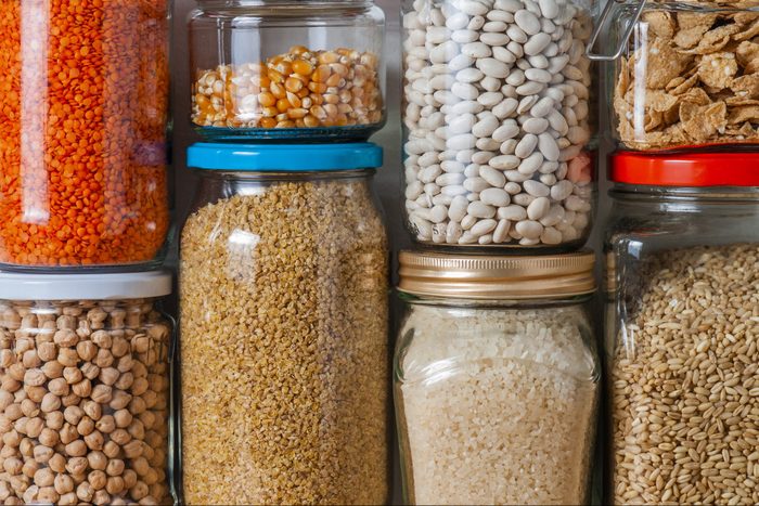 close up of glass jars on a Shelf in a Kitchen Pantry