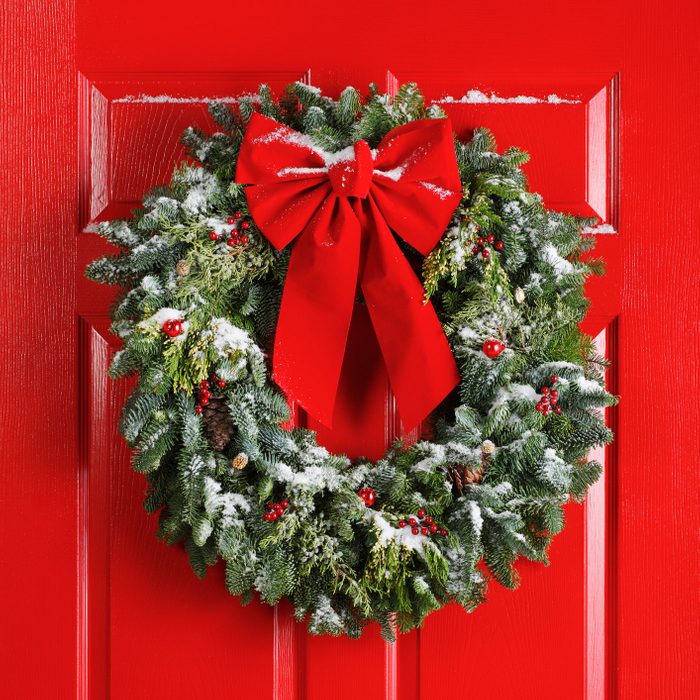 christmas wreath hanging on front door