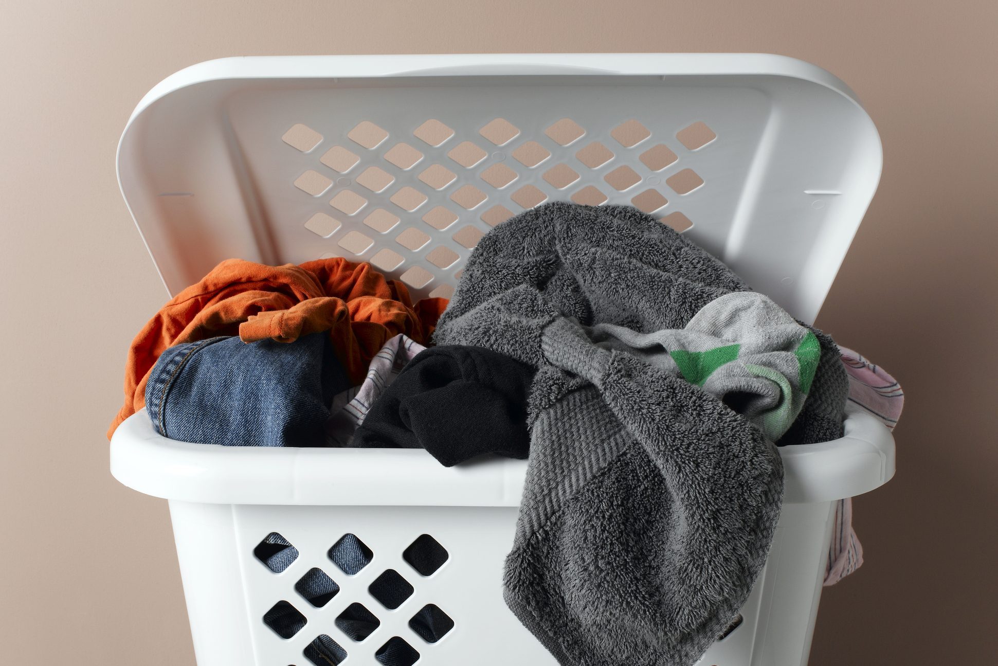 Laundry basket filled with washing, close-up