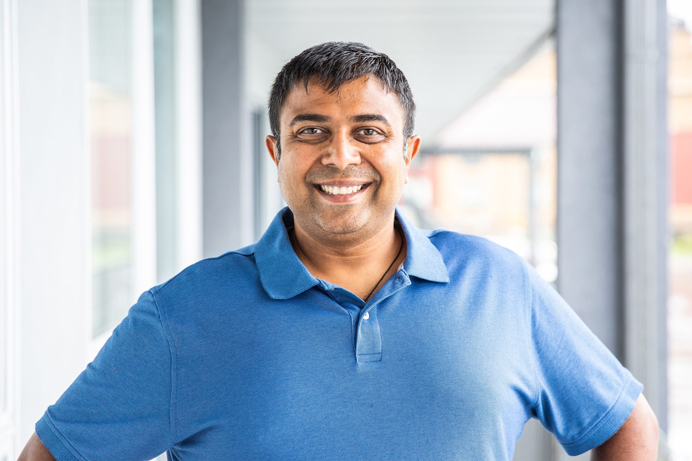Owner Sean Patel poses for a photo at the Quality Inn in Kodak, Tenn.