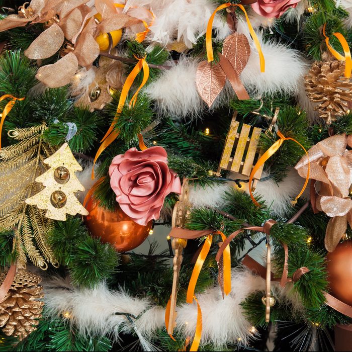 Christmas and New year background with green Tree decorated with toys