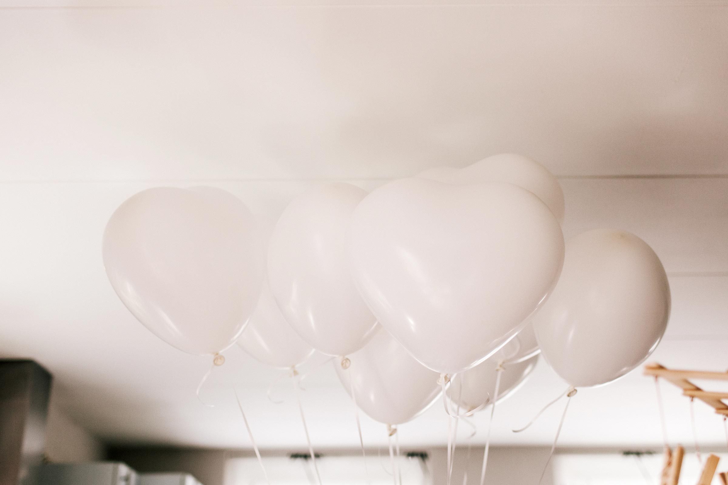 white balloons on ceiling