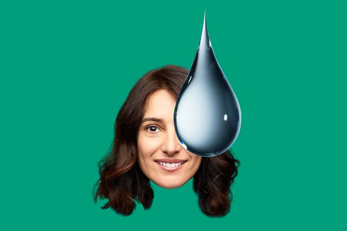 womans face collaged with a single drop of water