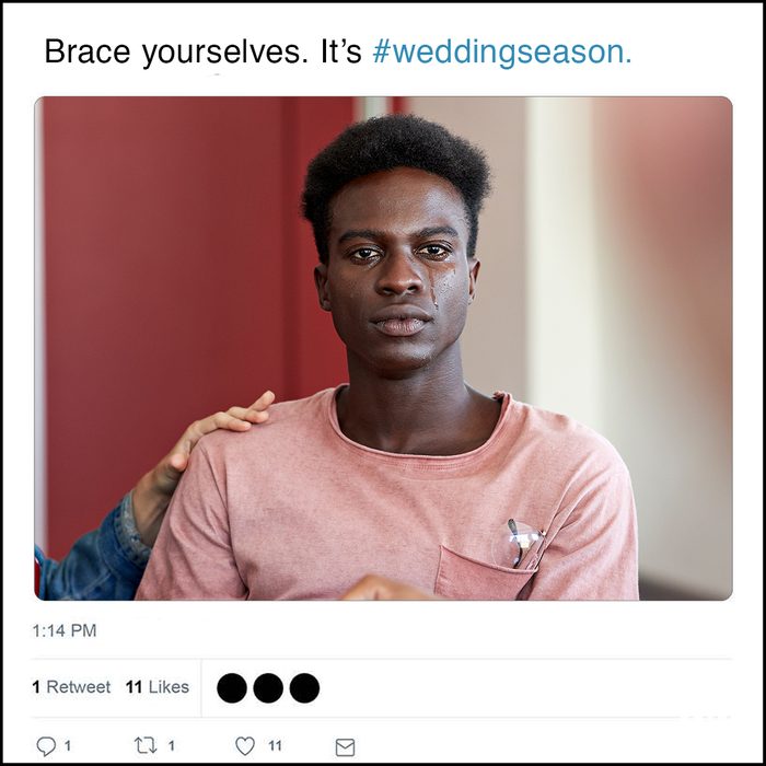 Sad young man crying while being consoled by female friends