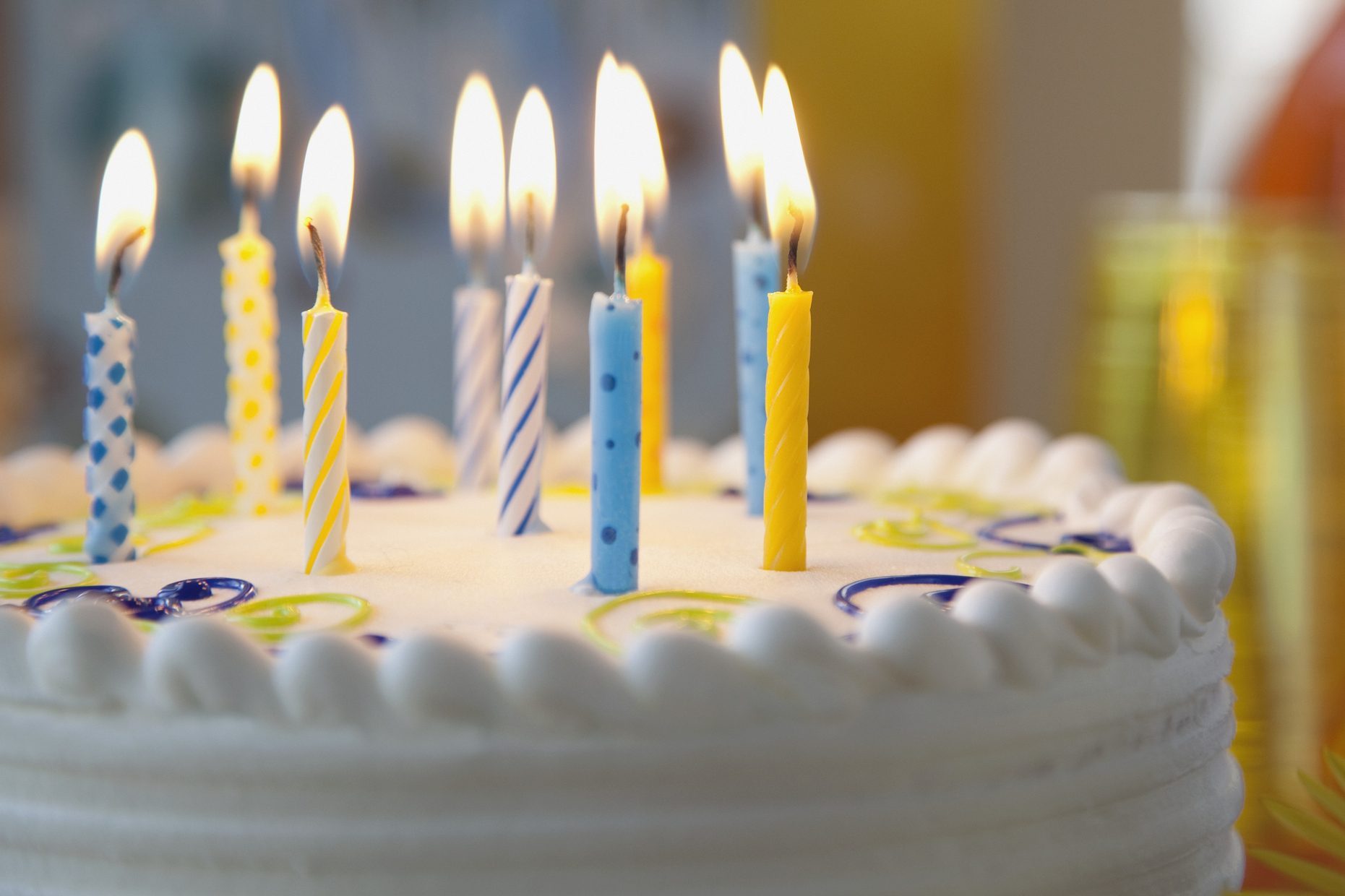 Birthday cake with lit candles