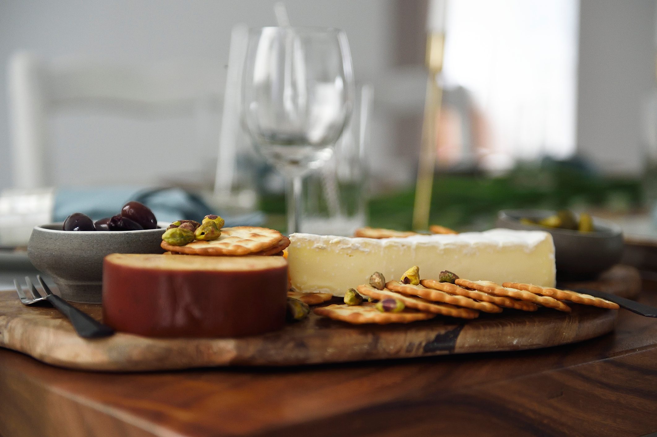 Cheese plate on a table at home during christmas time