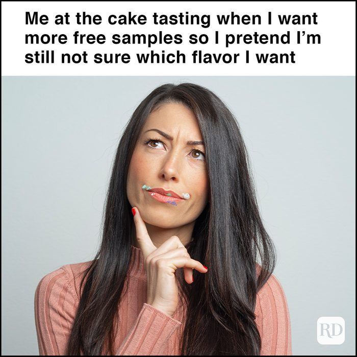 Portrait of a young lady making a thoughtful face in front of Light blue background