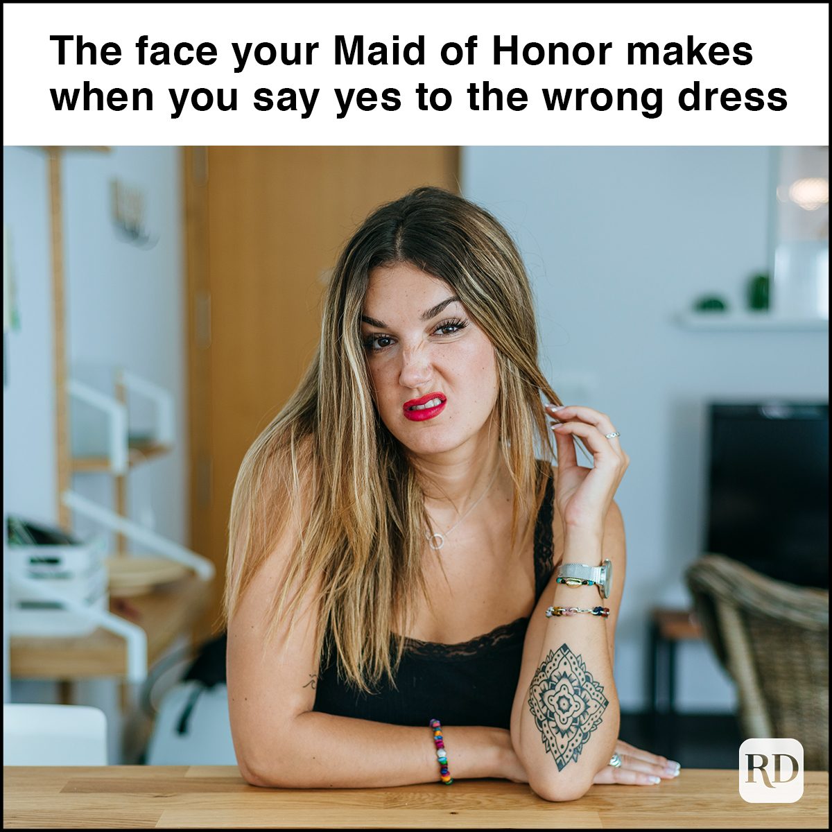 Portrait of woman with angry face in home's living room