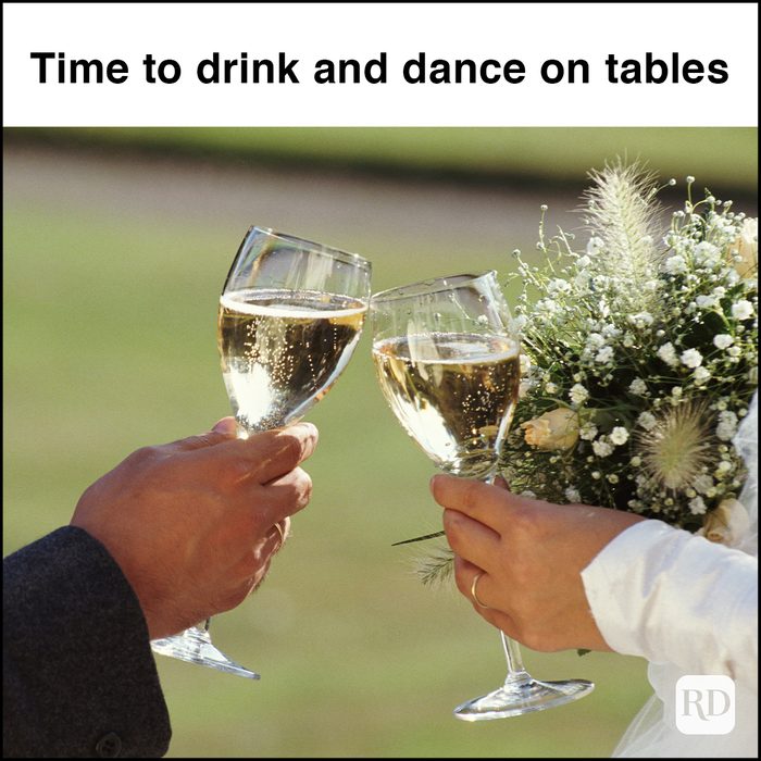 BRIDE & GROOM TOASTING WITH CHAMPAGNE