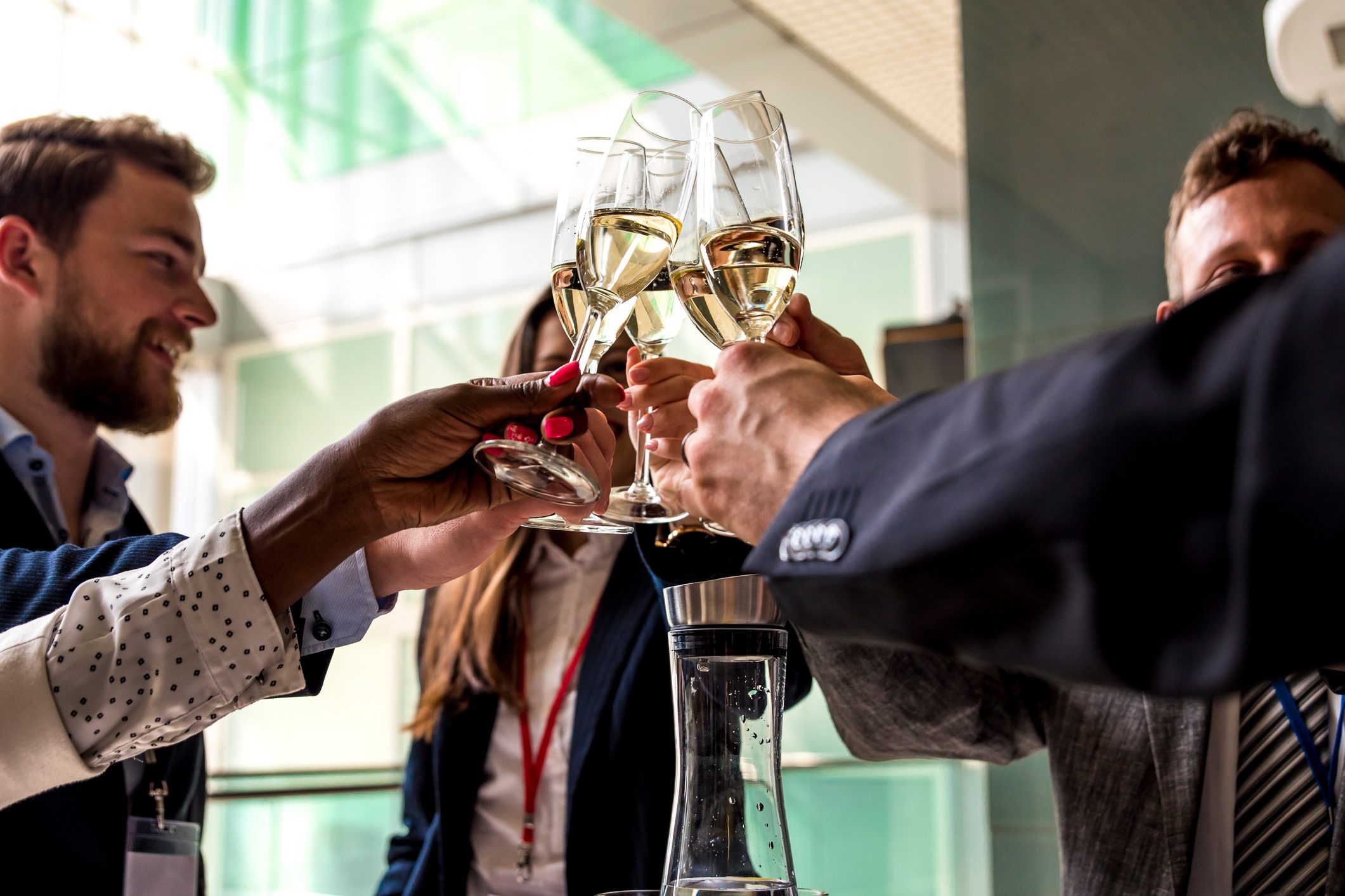 group of friends toasting with champagne glasses