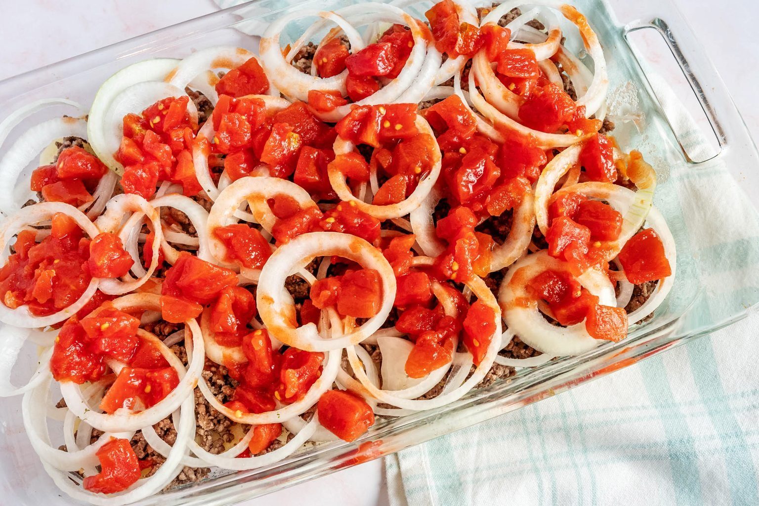 Dolly Parton Casserole Tomatoes on top of the onions