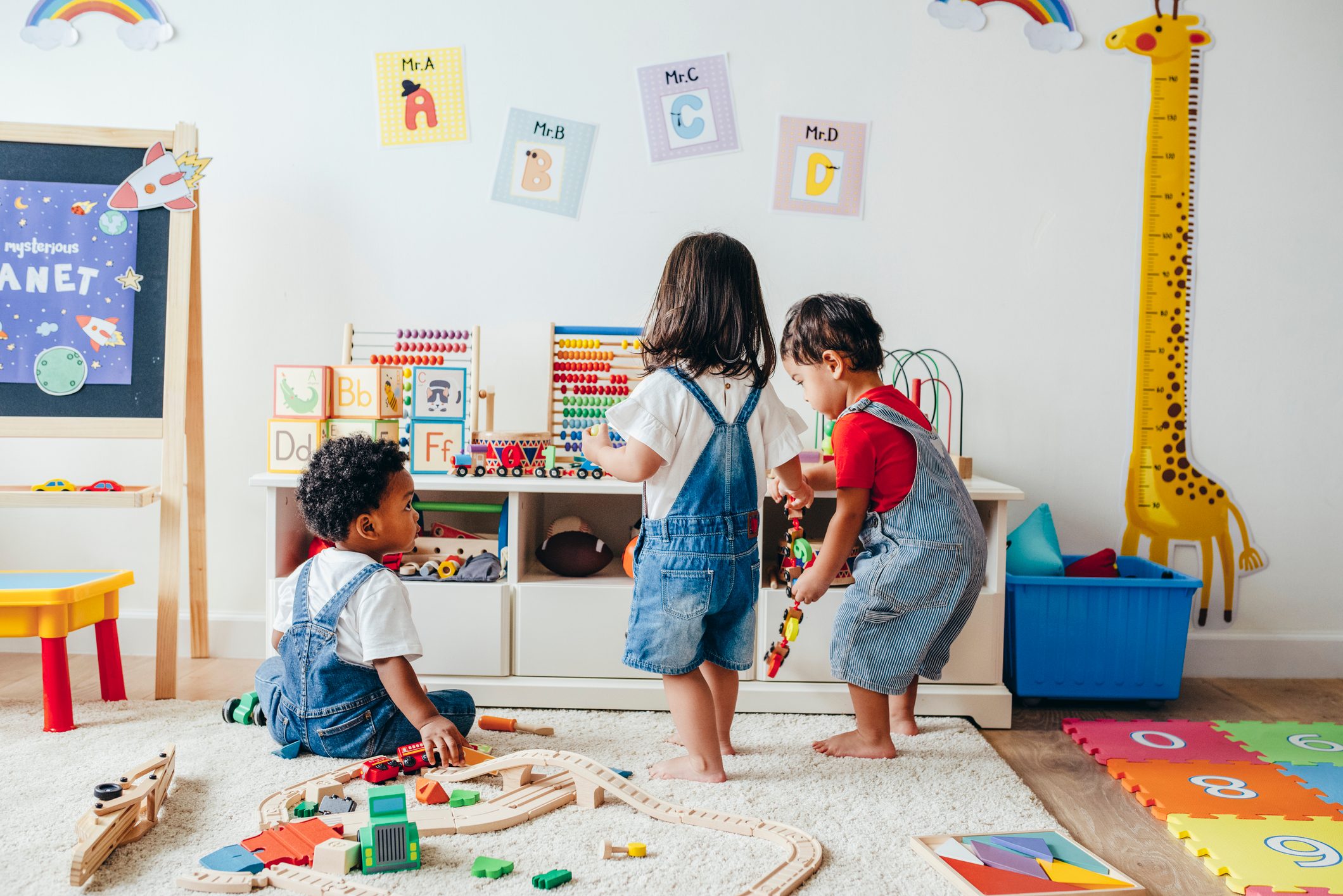 Young children enjoying in the playroom