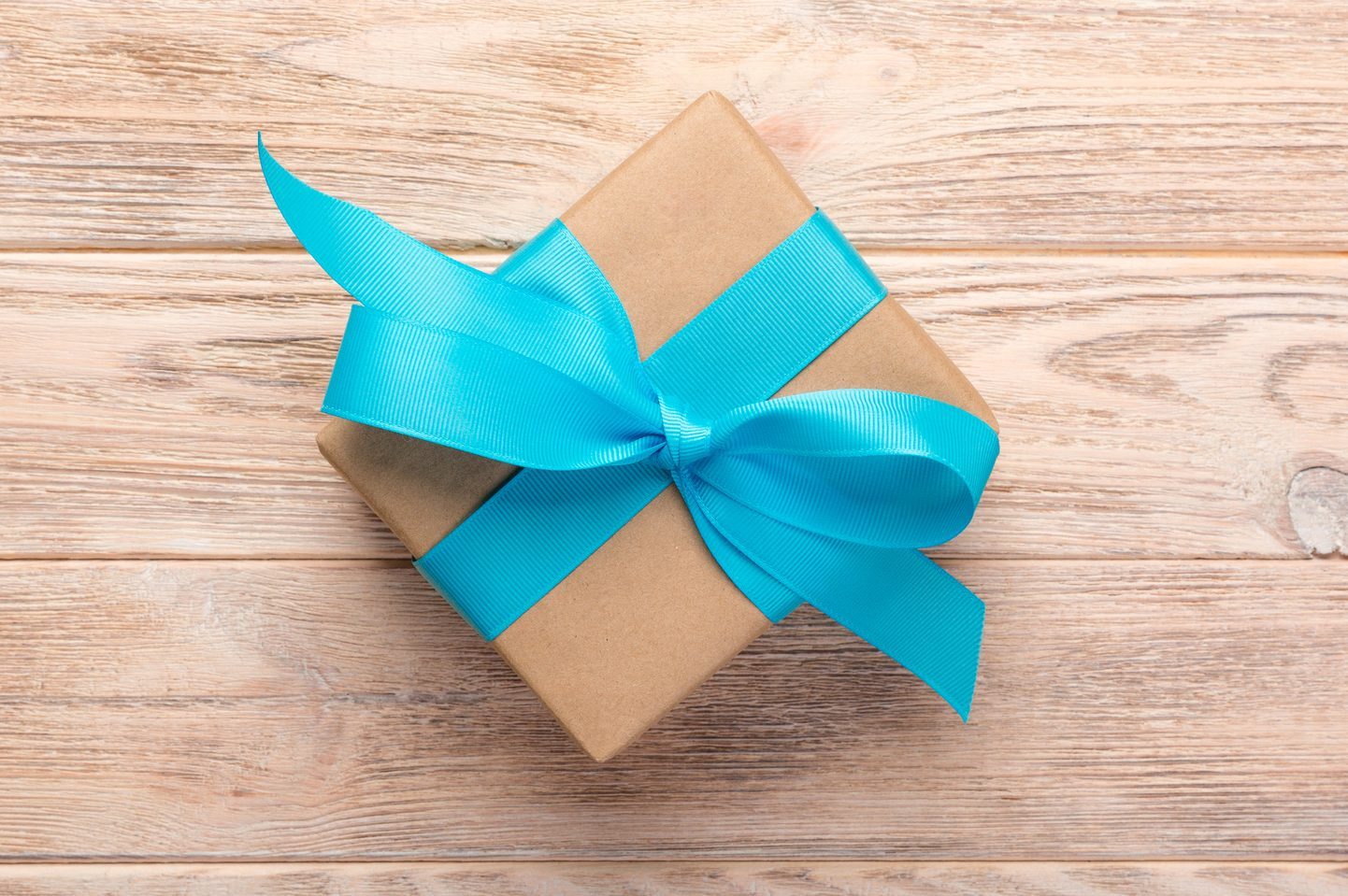 High Angle View Of Gift Box On Wooden Table