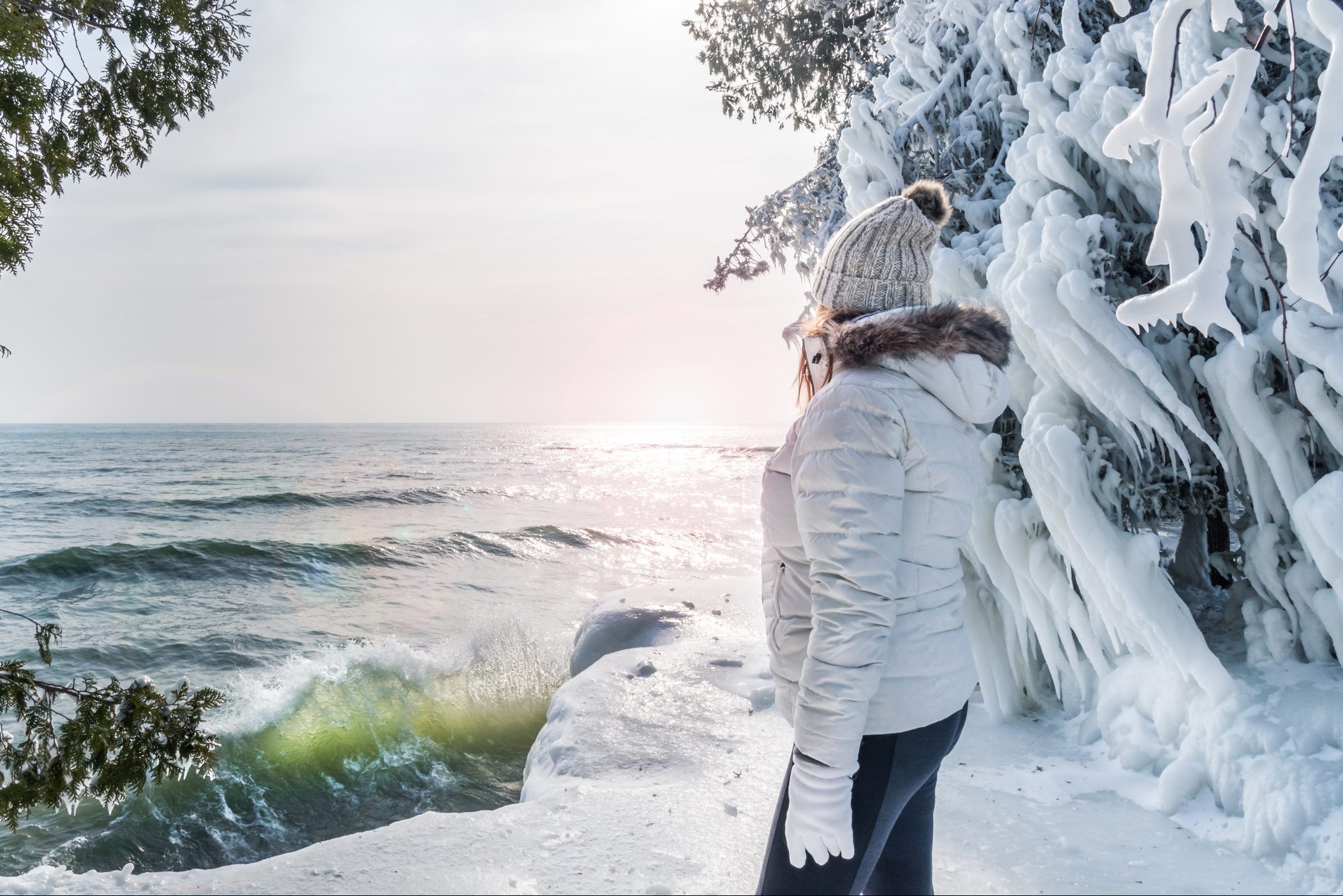 Woman Standing By Lake Against Sky During Winter in Sturgeon Bay