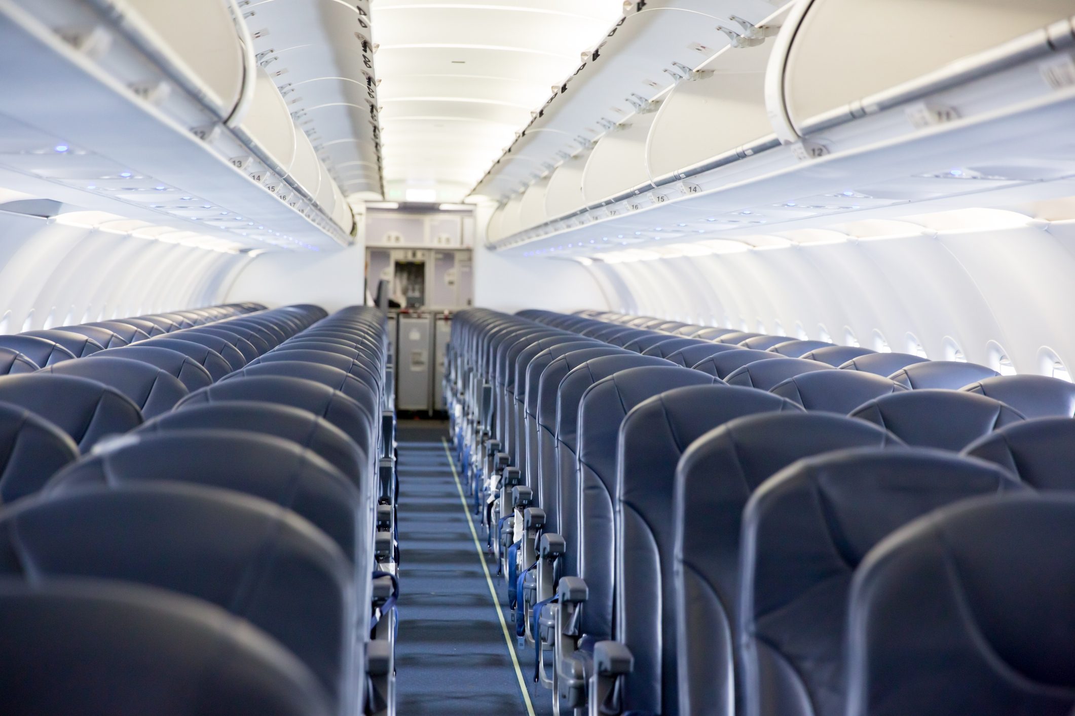 Looking down the aisle a of empty passenger jet. RM