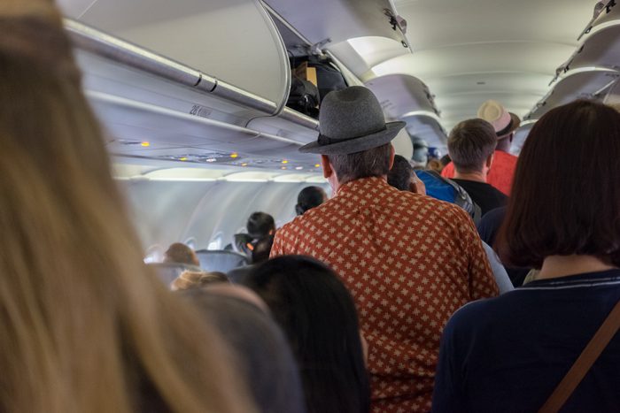 Passengers disembarking aircraft on arrival