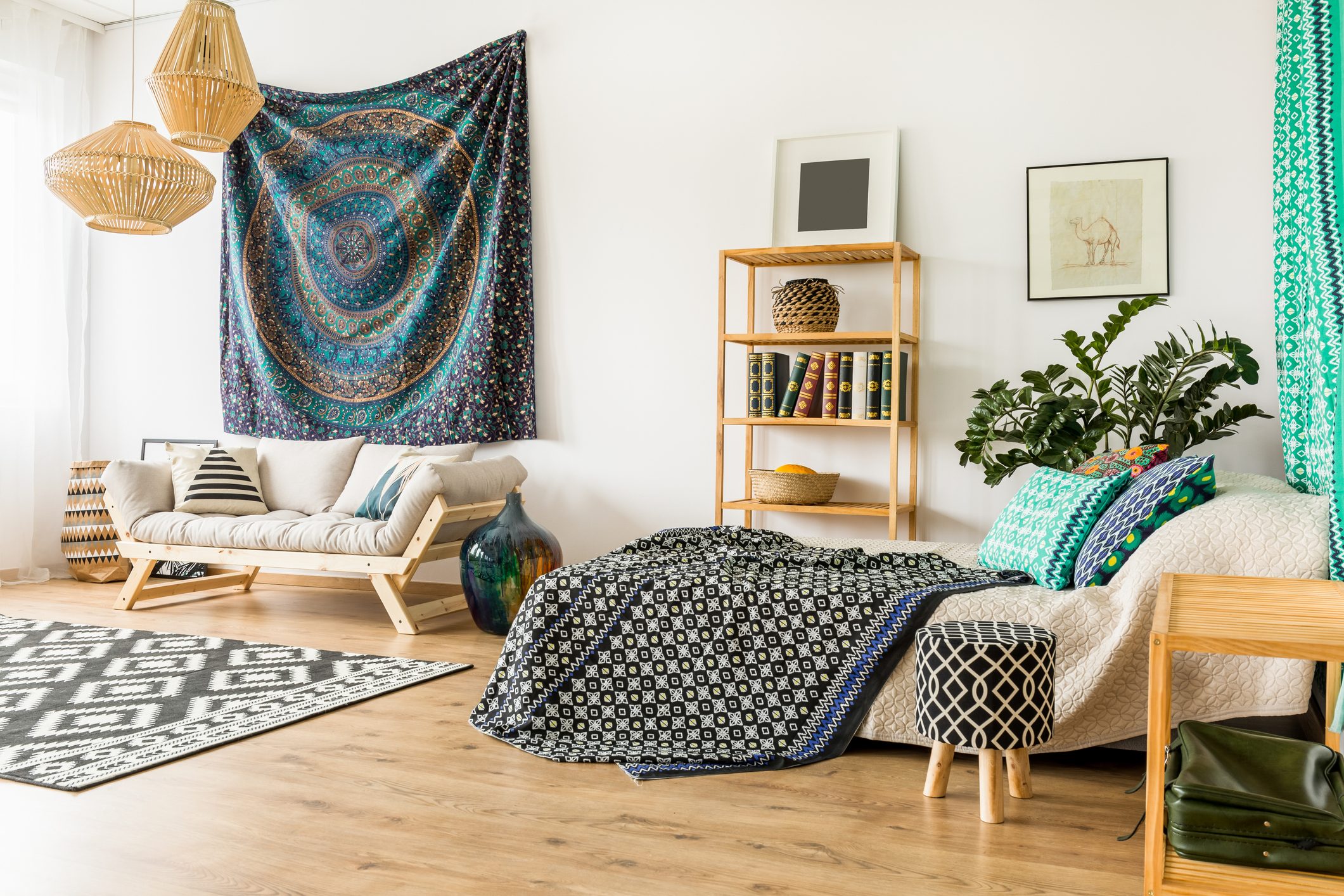 Modern room with sofa and bed designed in oriental style