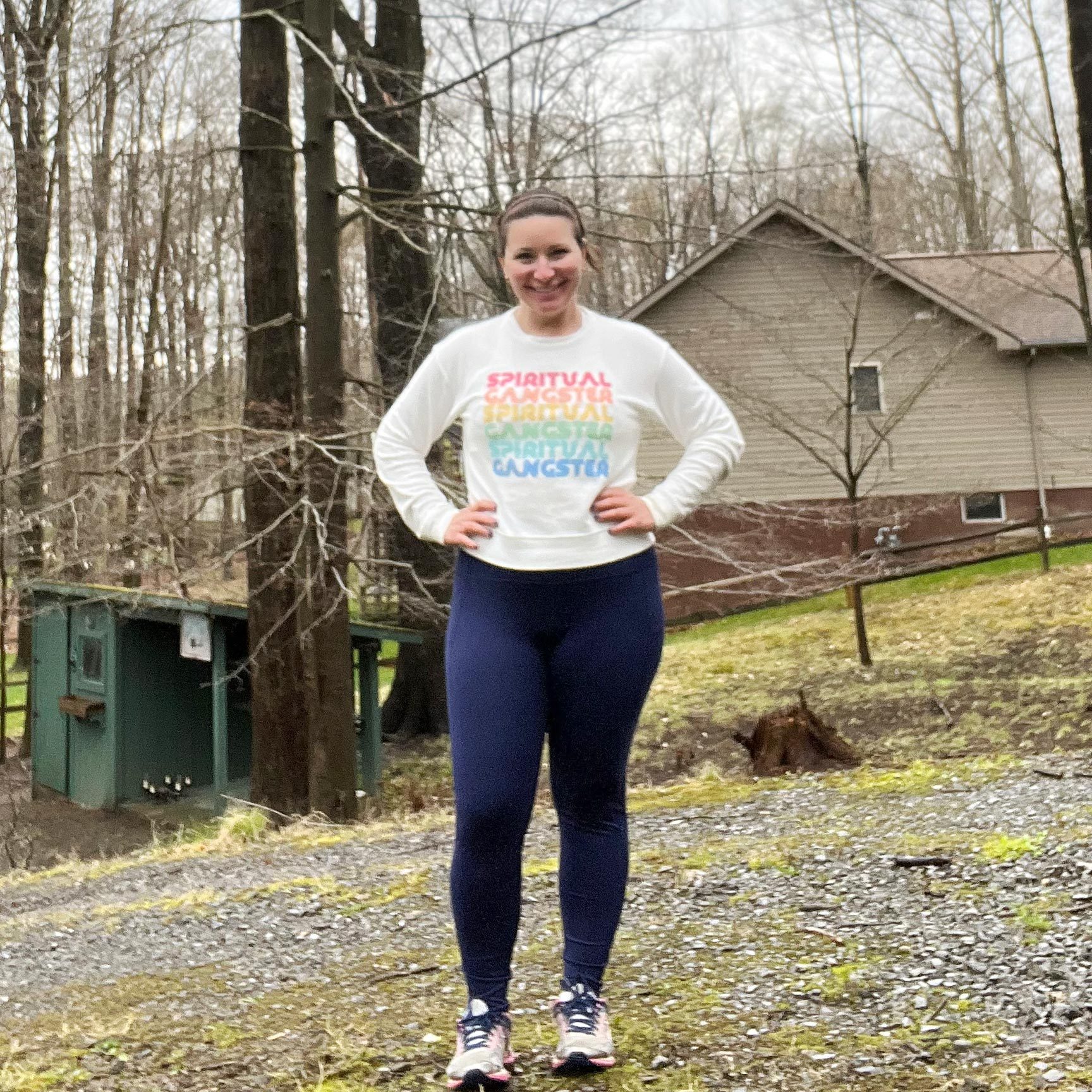 woman standing outside in leggings