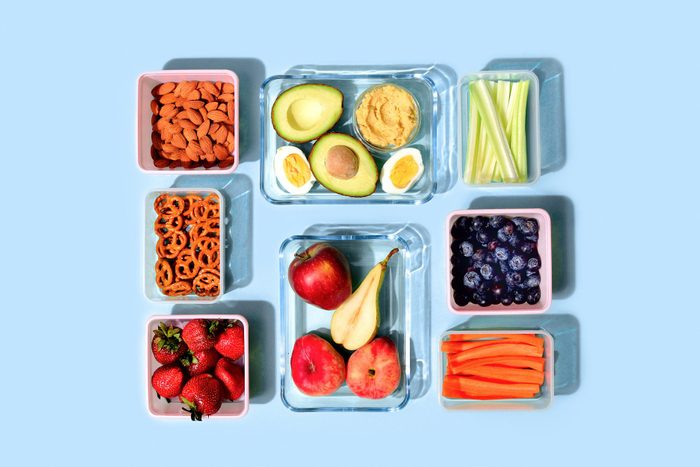 glass food storage containerss with fresh raw food, healthy food concept