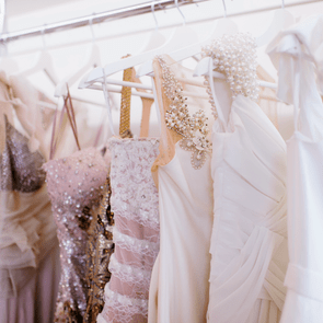 rack of Wedding Attire and dresses on a clothes rack