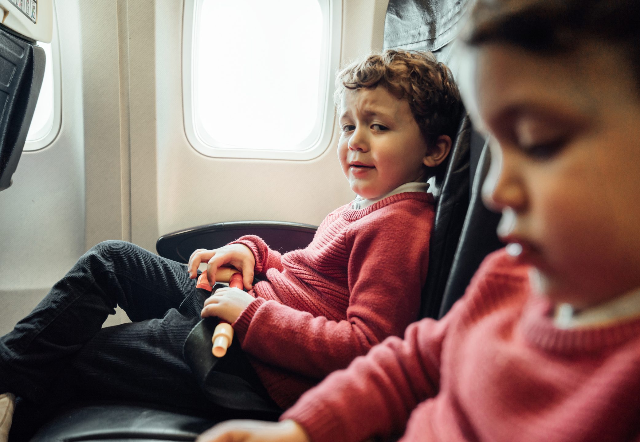 Brothers on an airplane