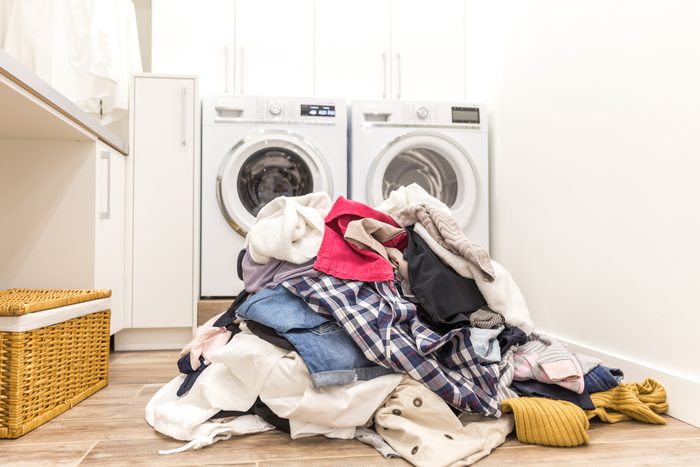 Laundry room with a pile of dirty clothes